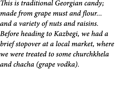 This is traditional Georgian candy  made from grape must and flour    and a variety of nuts and raisins  Before headi   