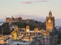 Sherlock Holmes’ Scotland – It Would Be a Crime to Miss It! Edinburgh Castle and the Balmoral Hotel clocktower at sunrise