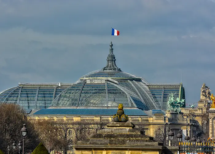 Grand palais low angle view of golden gate of building against sky