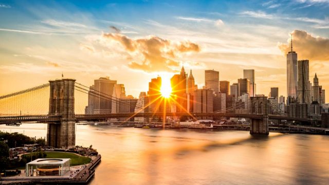 Brooklyn Bridge and the Lower Manhattan skyline at sunset, as viewed from Manhattan Bridge