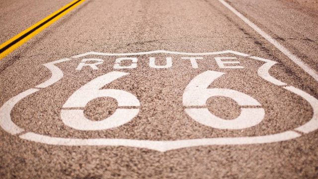 route 66 sign painted on the hyway