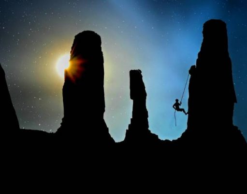 How to Make Your Outdoor Adventures More Challenging person rock climbing