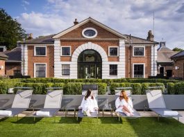 girls on lounge chairs outside a UK spa