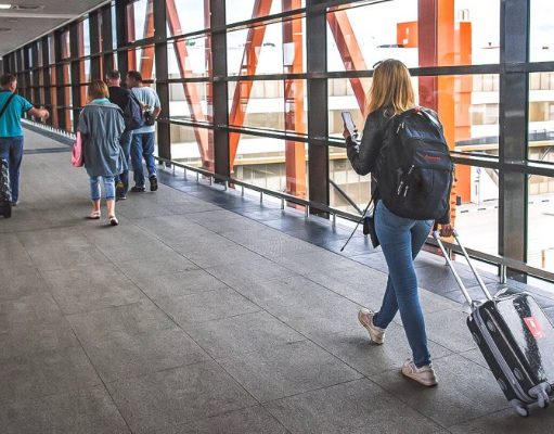 Russpass Tourist Resource Gains Three New Features tourist at airport in Russia