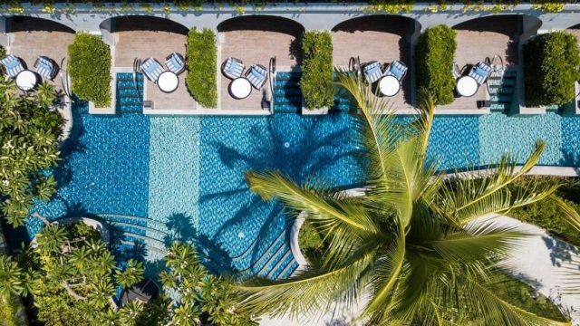 looking down at a hotel pool