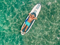 Viva Wyndham Resorts Unveils New Boomer Package boomer man floating on a paddle board