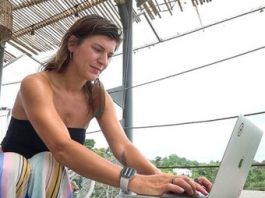 woman working on a laptop computer from Costa Rica