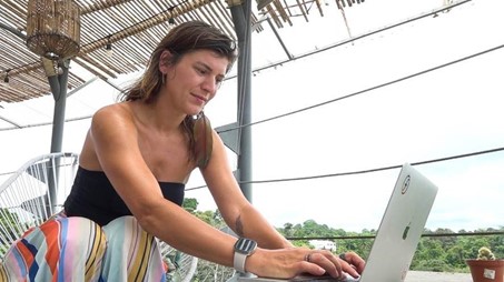 woman working on a laptop computer from Costa Rica