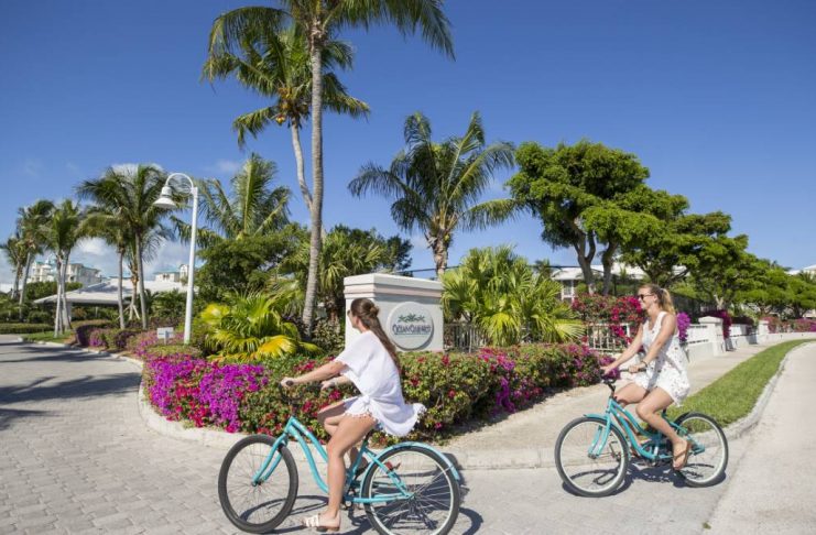 two girls riding thier bikes at Ocean Club Resorts