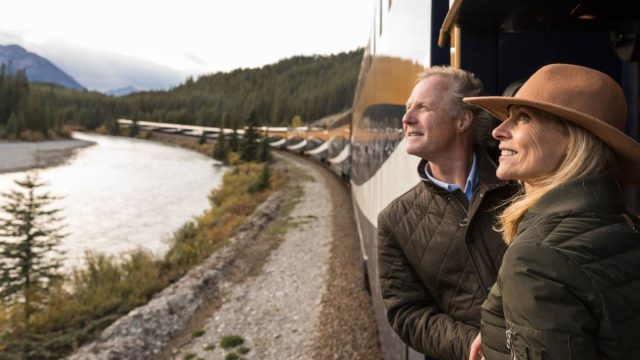 couple riding the luxury train Rocky Mountaineer