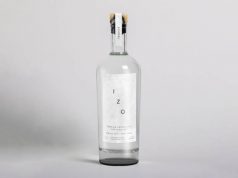 IZO 100% Agave Tequila Extra Añejo Cristalino a botle of tequila