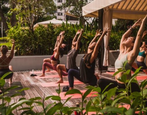 Hyatt Loves Local to Help Revitalize Communities group yoga at a Hyatt hotel