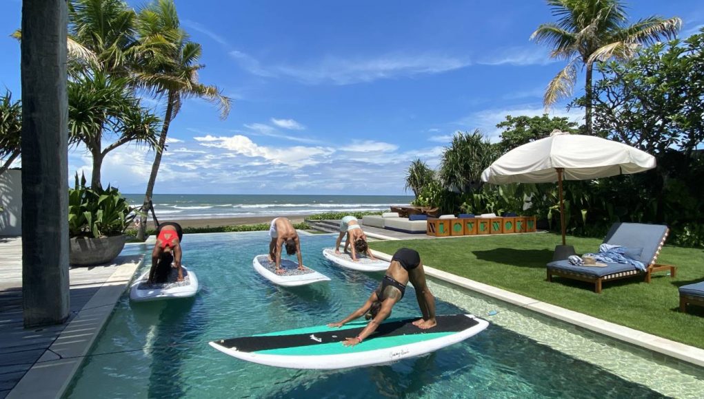 paddleboard yoga at Noku Beach House Bali