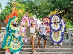 Travel to The Bahamas with Ease People in the Bahamas dancing at carnival