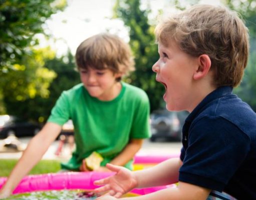 5 Practices to Boost Your Kids’ Language Skills While Traveling kids laying while traveling