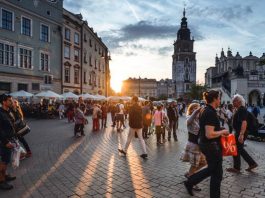 Tourists on Main Market Square in Krakow, Poland.