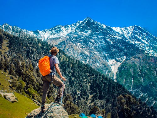 a man hiking in the mountains