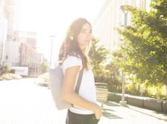 Solo New York- Experience Summer Travels with Ease girl wearing a Solo backpack
