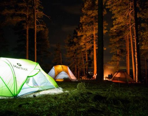 How To Make Your Camping Adventure Better Than Ever tents camping in the woods at night