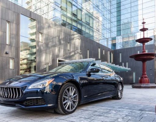 Maserati Quattroporte Official House Car of Four Seasons Hotel Toronto Maserati car in front of four Seasons Toronto