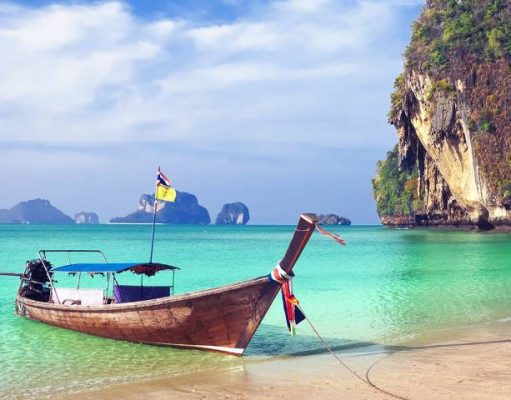 Your Guide to Phuket Real Estate and Lifestyle: From Hidden Beaches to High-ROI Projects local fishing boat in Phuket