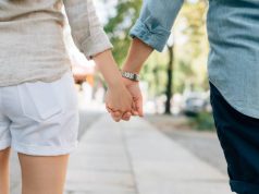 5 Really Cool Date Night Ideas couple walking and holding hands