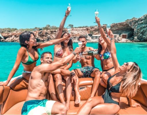 7 Beach Destinations You Should Visit as a Student Young people enjoying the high life in Ibiza