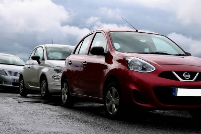 cars in an airport parking lot