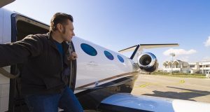 Travel Without Limits: The World at Your Fingertips, Combining Comfort and Exclusivity with Private Jet Finder man getting off private jet