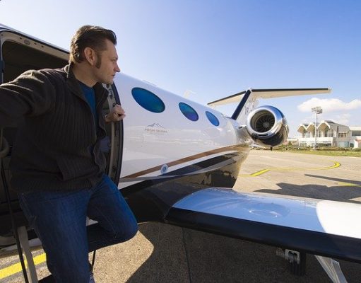 On-Demand Private Aviation Company, Aerial Jets man getting off private jet