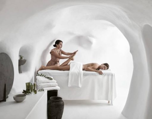 OMMA Santorini Launches ELEMIS Treatments woman getting a spa treatment in Santorini