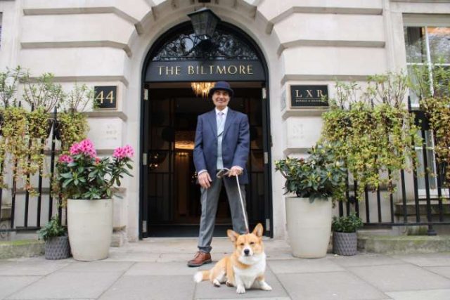 The Biltmore Mayfair London with dorrman and corgi dog