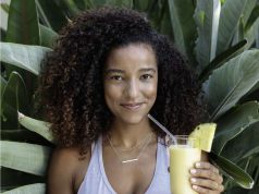 Four Seasons Hotel Westlake Village Announces the Opening of the Center for Health & Wellbeing girl holding wellness smoothie