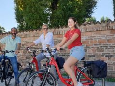 Hotel Certification Program Targets Surging LGBTQ Travel travelers on bikes in Italy