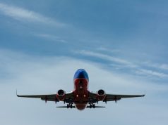 Safe Air Travel For Expectant Moms plane taking off at airport