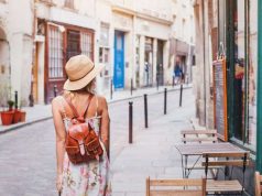 Language Courses Are This Summer’s Must-Have Travel Item Woman Tourist Walking On The Street
