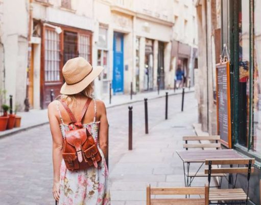 Language Courses Are This Summer’s Must-Have Travel Item Woman Tourist Walking On The Street