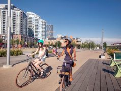 4 of the Best Urban Neighborhoods in Canada girls riding bicycle in Calgary
