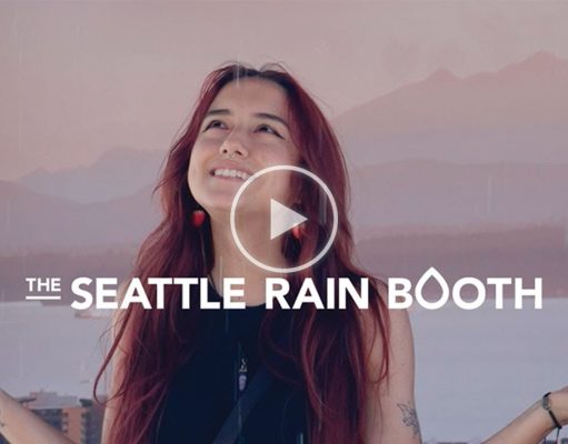 Traveling ‘Kissing in the Rain’ Booth Surprises Warm-Weather Cities with the Magic and Romance of a Rainy Seattle Day