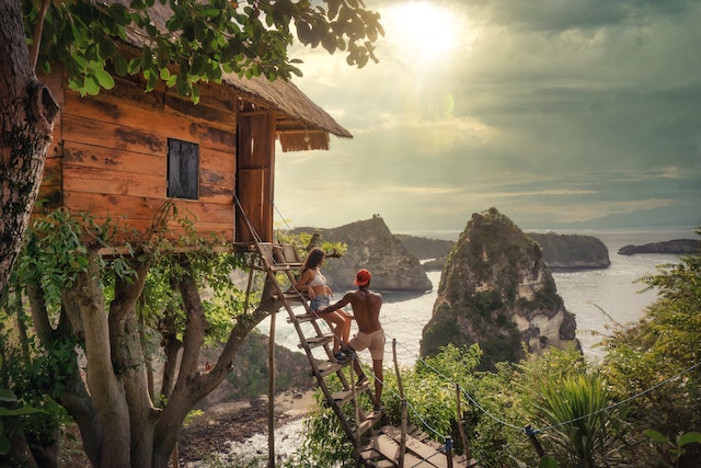 Couple Sitting on Brown Wooden Ladder Bali, Indonesia