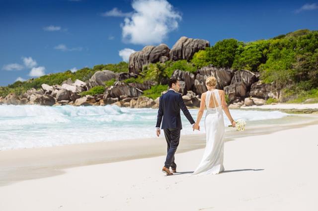 Couple walking on beach 