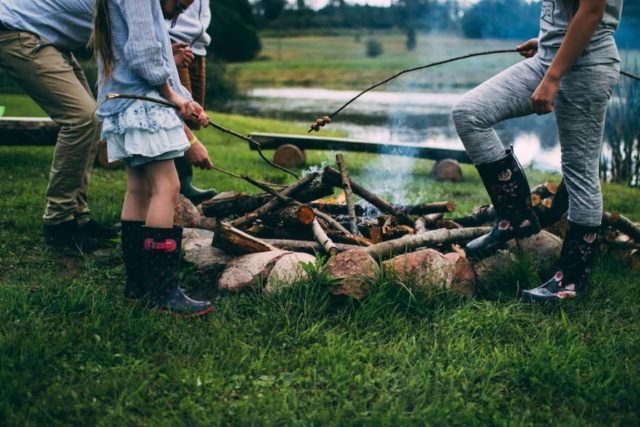 kid around a campfire