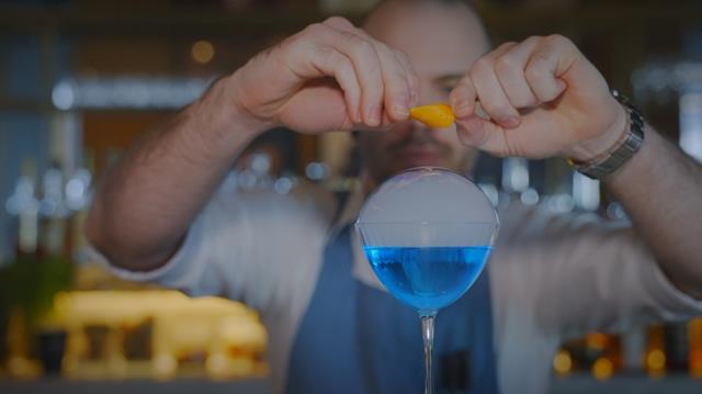 Bartender making drink  