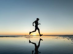 The Great Desert Race in Mexico Man running in desert
