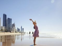New Direct Flight Takes Off From San Francisco To Brisbane With United Airlines Today Lady enjoying the beach in Brisbane
