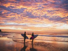 Feel-good moments await in Newcastle Surfers enjoying a morning in the water off Nobbys Beach, Newcastle.