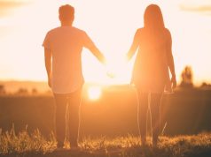 Romantic Getaways in Colorado holding hands at sunet Colorado