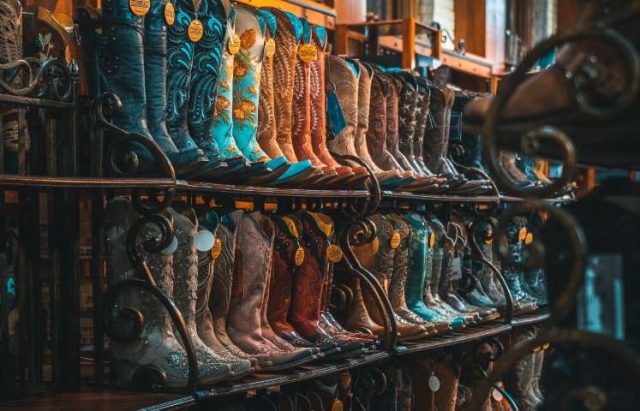 cowboy boots on a display rack