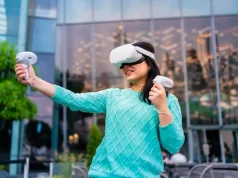 VR Casinos and Their Impact on Travel: The Future of Gambling asian female gamer playing virtual reality
