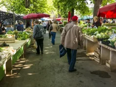 7 Insanely Fun Ways to Learn a Language While Traveling locals at a farmers market